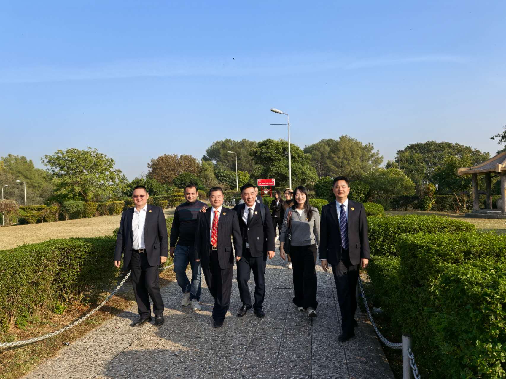 Delegation visit and on-site engagement outdoors